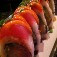 Dancing Dragon Roll · Eel avocado, cucumber inside and topped with tuna and bonito in special sauce.