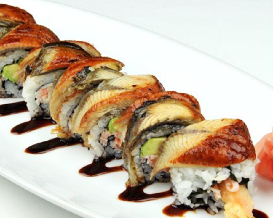 Black Dragon Roll · Shrimp tempura inside, topped with eel, avocado and eel sauce.