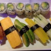 Vegetarian Sushi · Avocado cucumber roll and 7 pieces of vegetable sushi. Served with miso soup or salad.