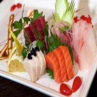 Sashimi Deluxe · 18 pieces of assorted fish. Served with miso soup or salad.