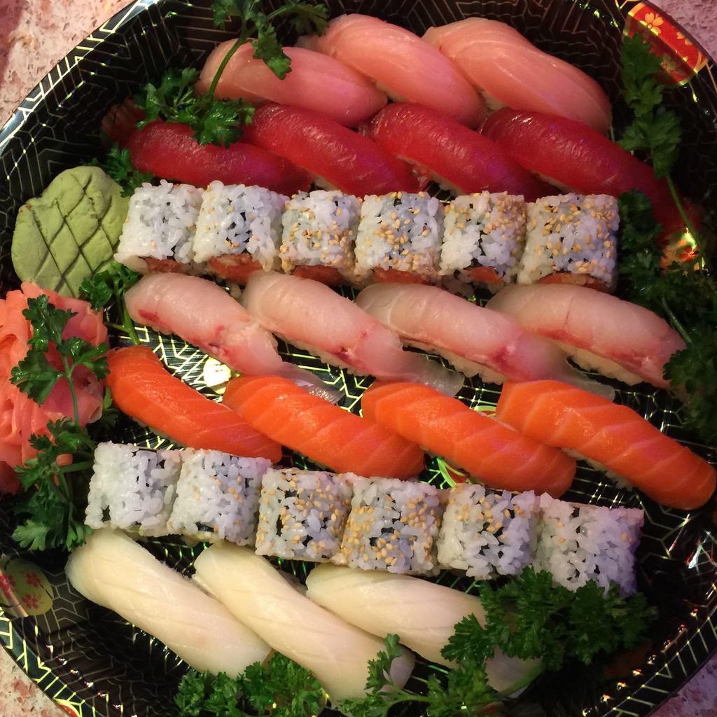 Sushi for 2 · 18 pieces sushi, 2 chef's special rolls. Served with miso soup or salad.