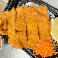 Chicken Katsu · Meat cutlet in breaded butter with homemade sauce on the side. Served with your choice of ri...