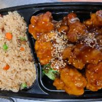 #C6. Sesame Chicken Combo Plate · White meat chicken breast.
Served with a choice of rice and a veggie spring roll. No substit...