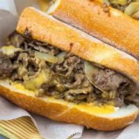 Philly Cheesesteak Sandwich · Served with fries and soda.