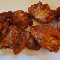 Chicharon de Pollo con Hueso  · Fried chicken chunks.