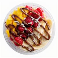 Mamma Mia Pitaya Bowl · Chocolate granola, mango, banana, raspberries, coconut flakes, ＆ drizzled nutella.