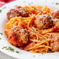 Spaghetti with Meatballs · Homemade pasta, our home made meatballs, served with garlic bread.