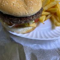 5. Beef Burger · Lettuce , tomatoes, onions, beef cheese, french fries, soda, optional: hot and garlic sauce.