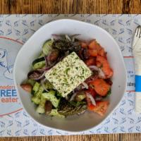 Greek Salad · Greek imported Feta, olives, stuffed grape leaves, vine ripened tomato, cucumber, onions and...