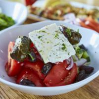 Horiatiki Salad · Imported Greek feta cheese, vine ripened tomatos, cucumbers, onions, olives and stuffed grap...