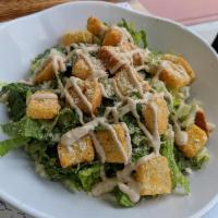 Caesar Salad · Lettuce, croutons and shaved Parmesan cheese with creamy Caesar dressing on the side.