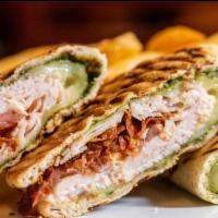 11. Chicken Club Panini · Grilled Chicken, bacon, brie cheese, plum tomatoes and house dressing.