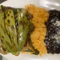 Bistec encebollados · Grilled steak with rice,beans,captus,jalapeno ,onion , 4 tortillas made by hand 