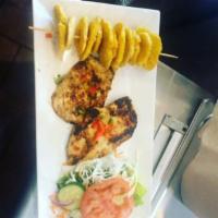 Pechuga de Pollo/Chicken Breast · Served with salad and choice of side order.