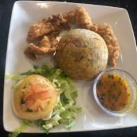 Mofongo de Pollo/Chicken Mofongo · Served with salad.