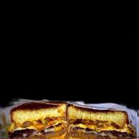 Breakfast burger  · Fried Egg , beef bacon , Swiss cheese ,grilled onions & peppers and tomatoe with chipotle ma...