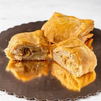 Cod Fish Pattie · 1 Haitian style puff pastrie filled with delicious cod fish