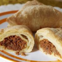 Herring Pattie · Haitian style puff pastries filled with delicious herring aran.