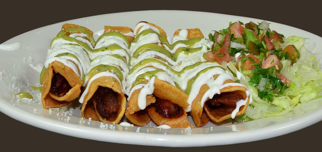 Tacos Dorados · 4 tacos. Chicken only. Served with rice and beans. Topped with sour cream, lettuce and hot sauce.