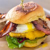 LIC burger  · ANGUS BEEF BURGER, CHEESE, APPLEWOOD SMOKED BACON, RUNNY EGG,
PICKLED CABBAGE, LETTUCE, TOMA...