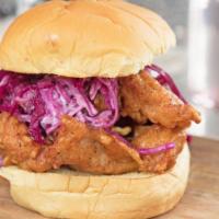 Buttermilk Chicken Burger · CRISPY BREADED CHICKEN THIGH, COLESLAW, PICKLED CABBAGE, CHIPOTLE MAYO, HOUSE SAUCE, ON A CL...