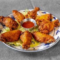 Ginger Wings · Ginger marinated, freshly battered and deep fried to perfection