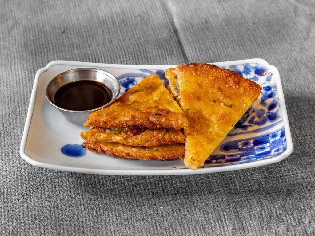 Scallion Pancake · Served with a house-made soy dipping sauce