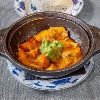 Mama's Curried Chicken · Dark meat (deboned) and potato in a traditional Malaysian coconut based curry. “King of Curr...