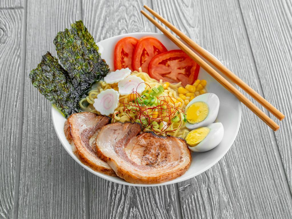 Tonkotsu Ramen · Slices pork, boiled egg, naruto, corn, green lettuce, seaweed, scallion, with tonkatsu or miso soup.