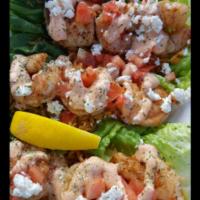 Spicy Lettuce Wraps · 3 romaine heart leaves filled with seasoned rice, tomatoes, and feta. Topped off with spicy ...
