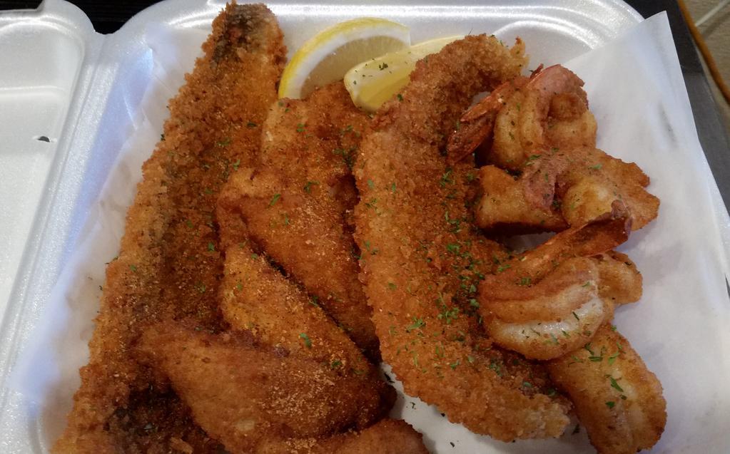 Variety Platter · Sample a little of everything. Includes shrimp, calamari, cod, catfish, perch, fries, and coleslaw.
