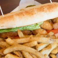 Shrimp Po Boy · Includes Spicy Ranch Sauce layered with green leaf lettuce, onion, pickles,  and tomatoes.