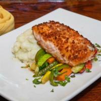 Salmon · Pan-roasted salmon served with mashed potato, seasonal veggies, and creamy champagne herbs s...