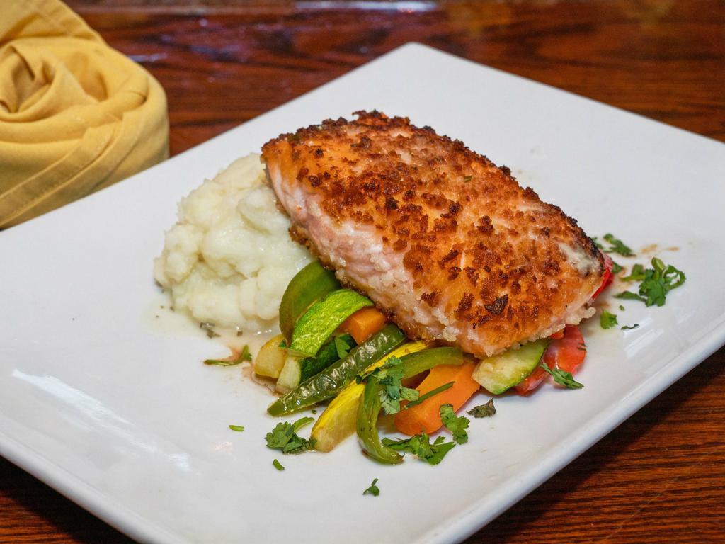 Salmon · Pan-roasted salmon served with mashed potato, seasonal veggies, and creamy champagne herbs sauce.