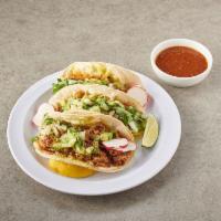 3 Pieces Taco · Corn tortillas with meat, onions, and cllantro.