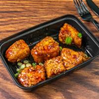 Ginger Glazed Salmon Bites · Seared salmon topped with our Mamacita ginger soy glaze sauce.