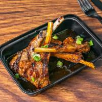 Ginger Soy Honey Glazed Lamb Chops · Grilled sofrito soy marinated lamb chops topped with our delicious Mamacita ginger soy glaze...
