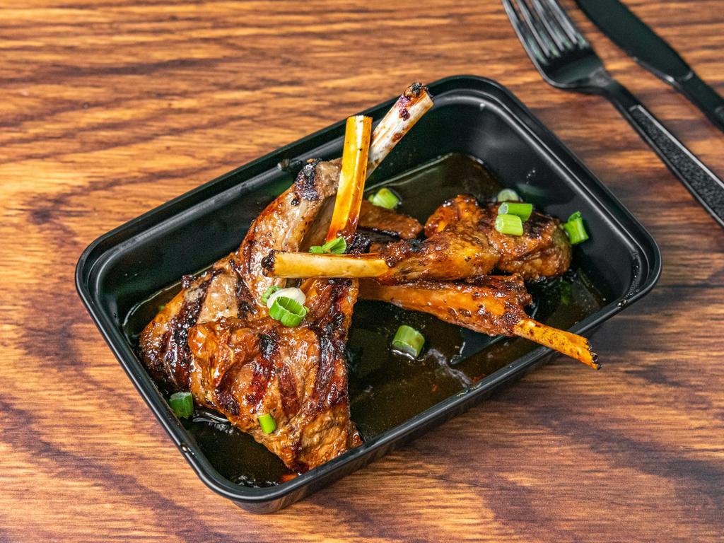 Ginger Soy Honey Glazed Lamb Chops · Grilled sofrito soy marinated lamb chops topped with our delicious Mamacita ginger soy glaze sauce.