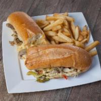 30. Philly Cheese Steak Sandwich · Top round steak, onions, peppers, mushrooms and Swiss cheese.