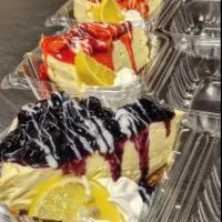 Lemon Berry Cheesecake · Lemon Cheesecake! Pick either Blueberry topping, raspberry, or strawberry!