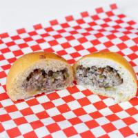 Bomber Kolache · Sausage and gravy with bacon and jalapenos.