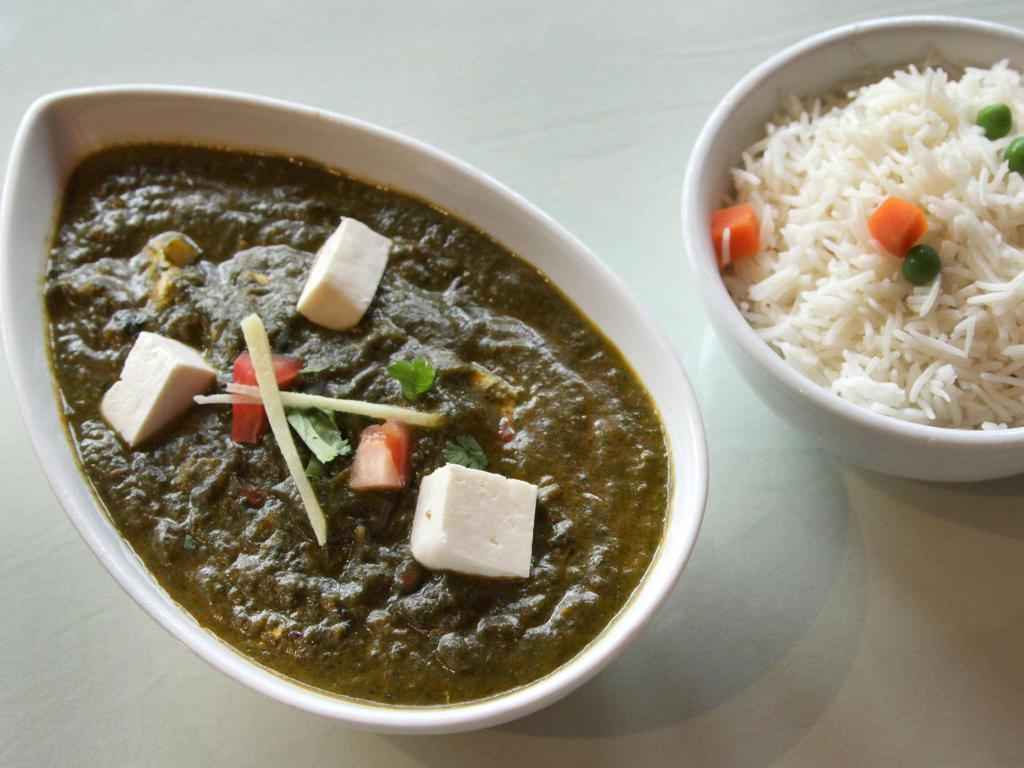 Saag Paneer · Spinach and paneer cheese with tomato and garden herbs. Served with basmati rice.