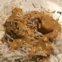 Chicken Korma · Skewered chicken cooked in nutty creamy gravy with a touch of saffron. Prepared with white m...