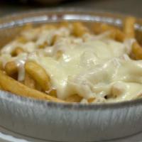 Cheese Fries · Cheese fries topped with melted mozzarella. Add extra cheese for an additional charge.