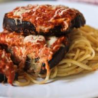 Chicken or Sausage Parmesan · Served with spaghetti pasta.