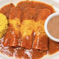 Las Principales · Three Ground Beef Enchiladas Topped With Melted Cheese And Beef Gravy. Served With Rice & Re...