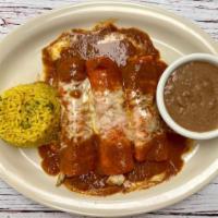 Las Reynas Chicken Fajita · Three Chicken Fajita Enchiladas Topped With Melted Cheese And Beef Gravy. Served With Rice &...