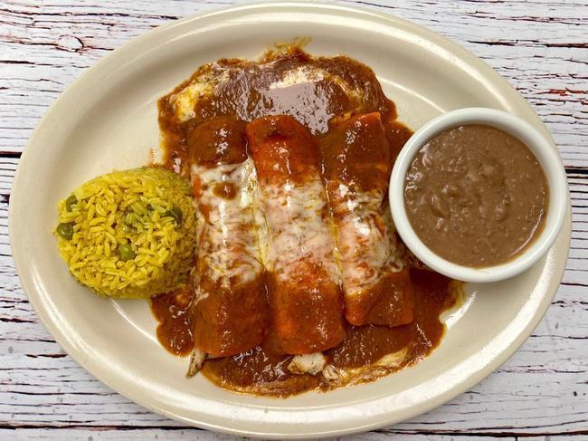 Las Reynas Chicken Fajita · Three Chicken Fajita Enchiladas Topped With Melted Cheese And Beef Gravy. Served With Rice & Refried Beans