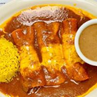 Las Reynas Beef Fajita · Three Beef Fajita Enchiladas Topped With Melted Cheese And Beef Gravy. Served With Rice & Re...