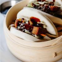 S5. CoCo Pork Bun · Bao bun with crispy pork belly, vegetables and signature hoisin sauce.